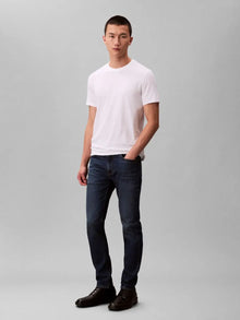  SLIM TAPERED JEANS OIL SLICK (PTR)